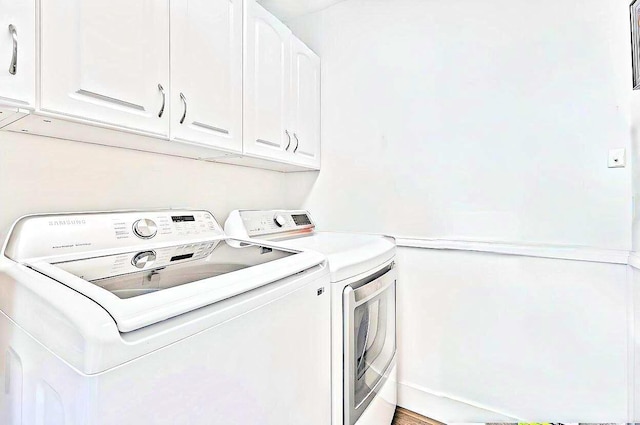 940 Turner Quay, Jupiter, FL 33458 - laundry room with cabinet space and independent washer and dryer