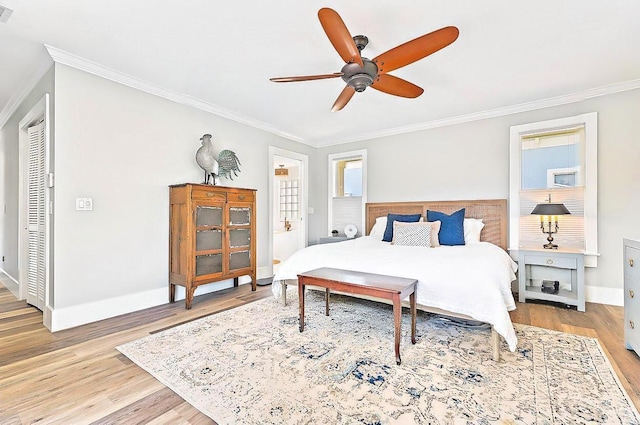 940 Turner Quay, Jupiter, FL 33458 - bedroom featuring light wood-style floors, ornamental molding, baseboards, and visible vents