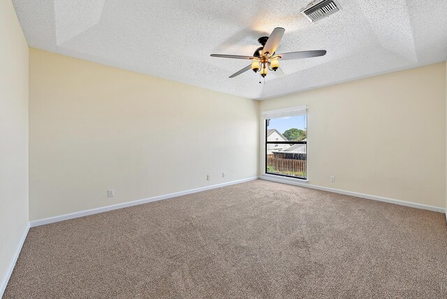 6089 Adams St, Jupiter, FL 33458 - spare room with a ceiling fan, carpet floors, a textured ceiling, visible vents, and baseboards