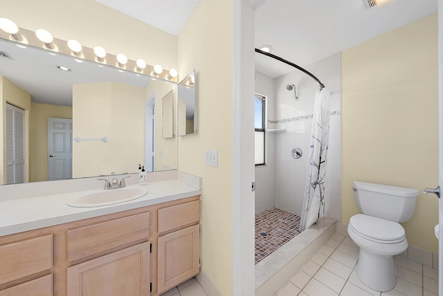 6089 Adams St, Jupiter, FL 33458 - full bath featuring toilet, a stall shower, tile patterned floors, visible vents, and vanity