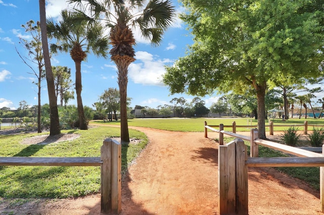 6089 Adams St, Jupiter, FL 33458 - view of community with fence and a lawn