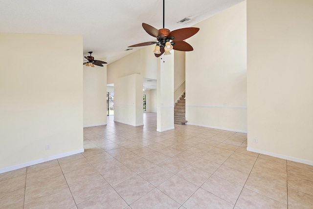 6089 Adams St, Jupiter, FL 33458 - spare room with light tile patterned floors, visible vents, baseboards, stairway, and ceiling fan