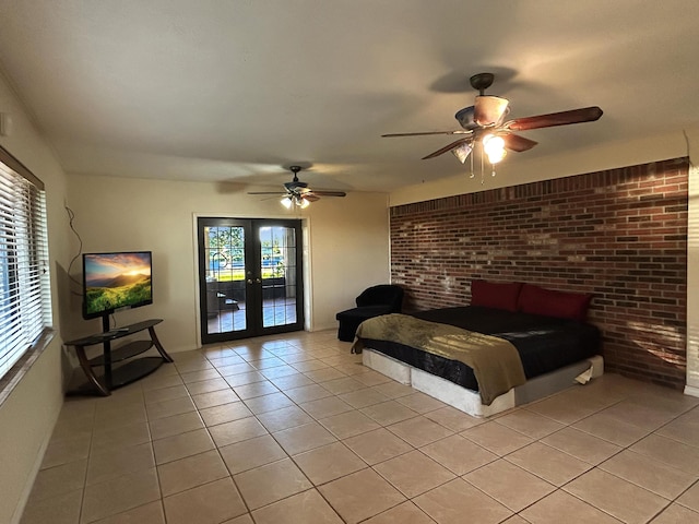 bedroom featuring light tile patterned floors, access to exterior, ceiling fan, baseboards, and french doors