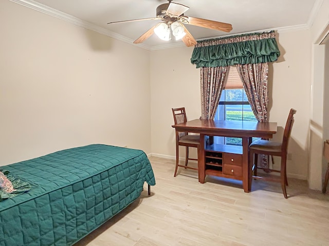 bedroom featuring ceiling fan, light wood-type flooring, ornamental molding, and baseboards
