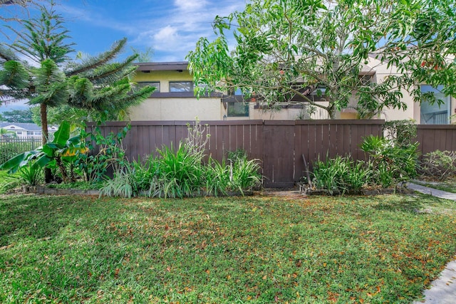 view of yard with fence