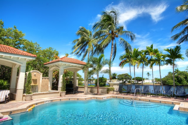 3211 Tuscany Way, Boynton Beach, FL 33435 - community pool with fence, a gazebo, and a patio area