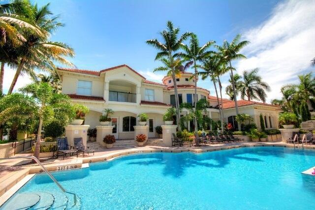3211 Tuscany Way, Boynton Beach, FL 33435 - community pool featuring a patio area