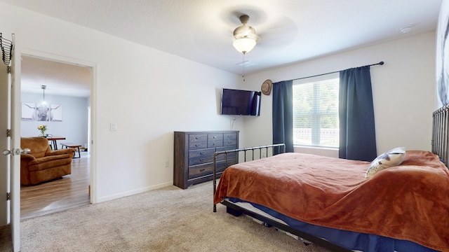 551 SW Lairo Ave, Port Saint Lucie, FL 34953 - bedroom with carpet floors and baseboards