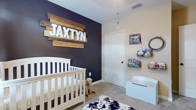 551 SW Lairo Ave, Port Saint Lucie, FL 34953 - bedroom featuring carpet flooring, a crib, visible vents, and baseboards
