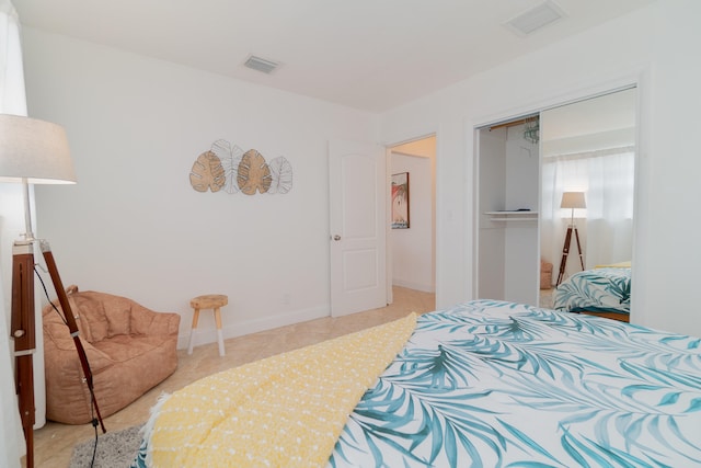 951 Green St, West Palm Beach, FL 33405 - bedroom featuring a closet and tile patterned flooring