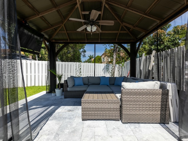 view of patio / terrace featuring outdoor lounge area, a gazebo, and a fenced backyard
