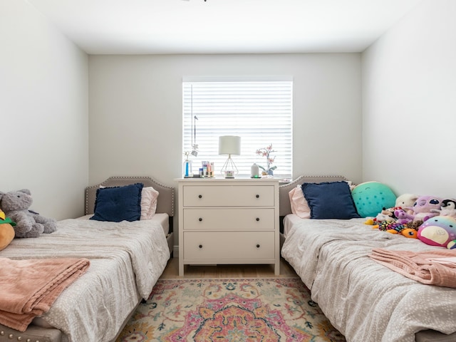 bedroom featuring light wood-type flooring