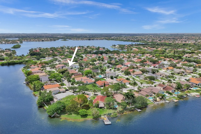bird's eye view featuring a residential view and a water view