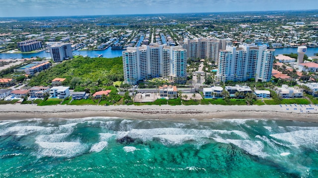 3740 S Ocean Blvd Unit 1602, Highland Beach, FL 33487 - drone / aerial view featuring a beach view, a water view, and a view of city