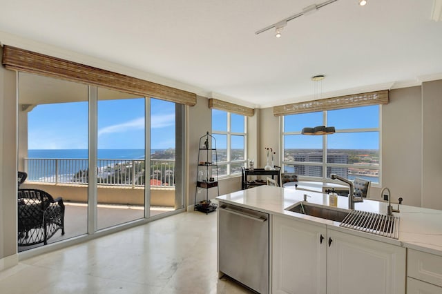 3740 S Ocean Blvd Unit 1602, Highland Beach, FL 33487 - kitchen featuring stainless steel dishwasher, ornamental molding, a water view, white cabinets, and decorative light fixtures