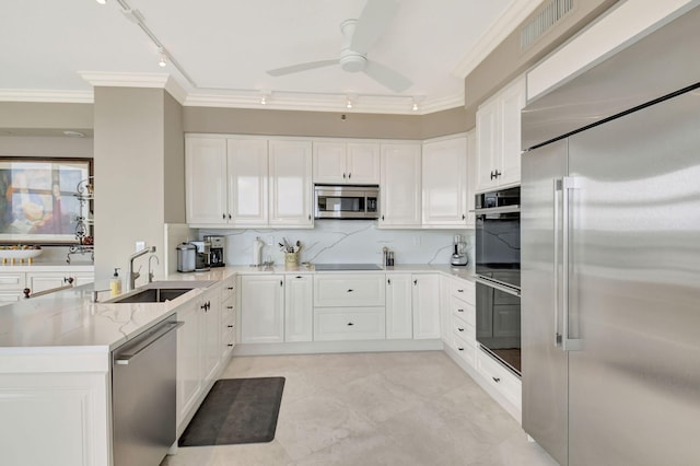 3740 S Ocean Blvd Unit 1602, Highland Beach, FL 33487 - kitchen featuring visible vents, ornamental molding, track lighting, a ceiling fan, and appliances with stainless steel finishes