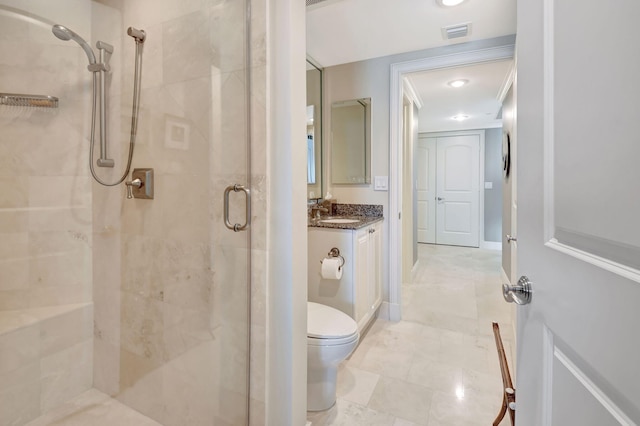 3740 S Ocean Blvd Unit 1602, Highland Beach, FL 33487 - full bath with toilet, visible vents, a shower stall, and vanity