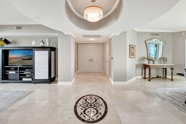3740 S Ocean Blvd Unit 1602, Highland Beach, FL 33487 - entryway featuring crown molding, baseboards, and visible vents