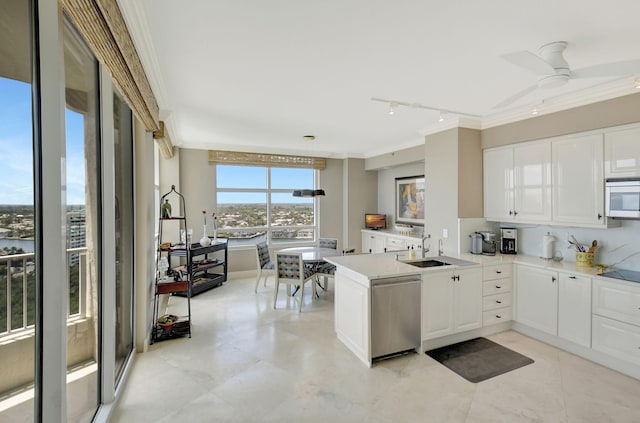 3740 S Ocean Blvd Unit 1602, Highland Beach, FL 33487 - kitchen with a sink, dishwasher, a peninsula, white microwave, and ornamental molding