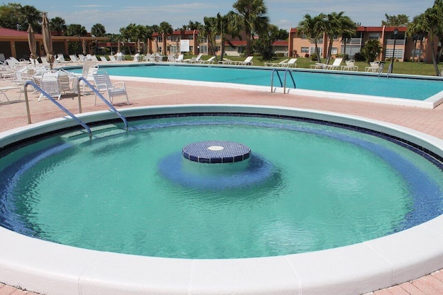 211 Lake Dora Dr, West Palm Beach, FL 33411 - community pool featuring a patio area