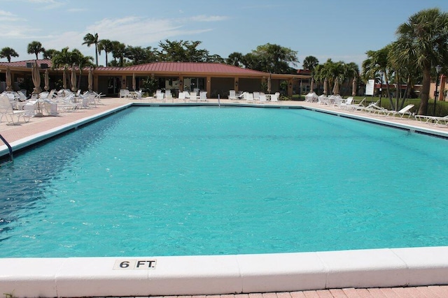 211 Lake Dora Dr, West Palm Beach, FL 33411 - community pool with a patio