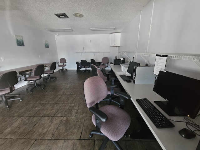 211 Lake Dora Dr, West Palm Beach, FL 33411 - office with a textured ceiling and tile patterned floors