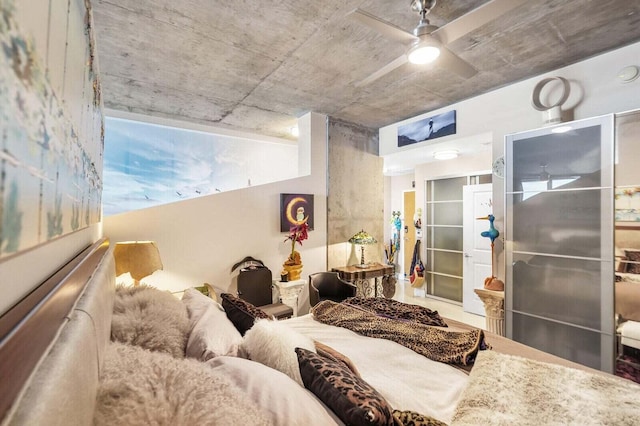 300 S Australian Ave Unit 409, West Palm Beach, FL 33401 - bedroom featuring a ceiling fan