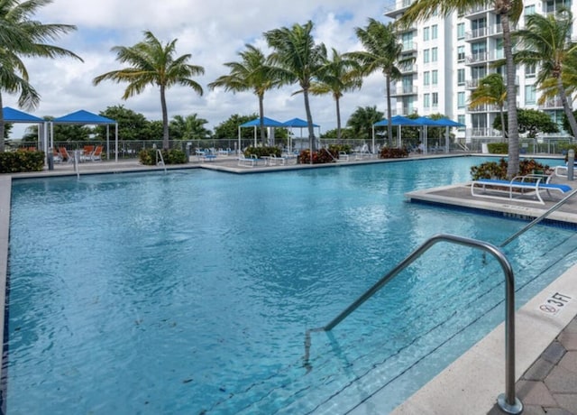 300 S Australian Ave Unit 409, West Palm Beach, FL 33401 - community pool with fence and a patio area