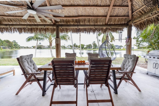 45 Misty Meadow Dr, Boynton Beach, FL 33436 - view of patio / terrace with a ceiling fan, outdoor dining space, a gazebo, and a water view