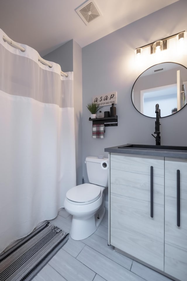 45 Misty Meadow Dr, Boynton Beach, FL 33436 - bathroom with visible vents, curtained shower, toilet, and vanity