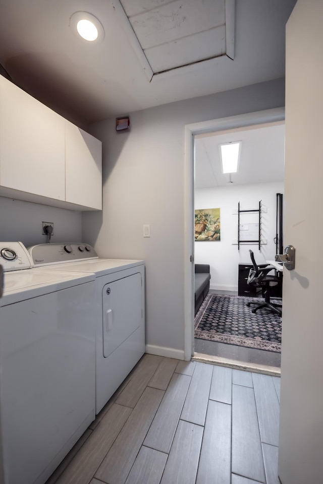 45 Misty Meadow Dr, Boynton Beach, FL 33436 - clothes washing area with wood tiled floor, cabinet space, independent washer and dryer, and baseboards