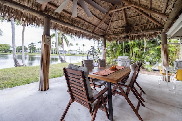 45 Misty Meadow Dr, Boynton Beach, FL 33436 - view of patio featuring outdoor dining space, a gazebo, ceiling fan, and a water view
