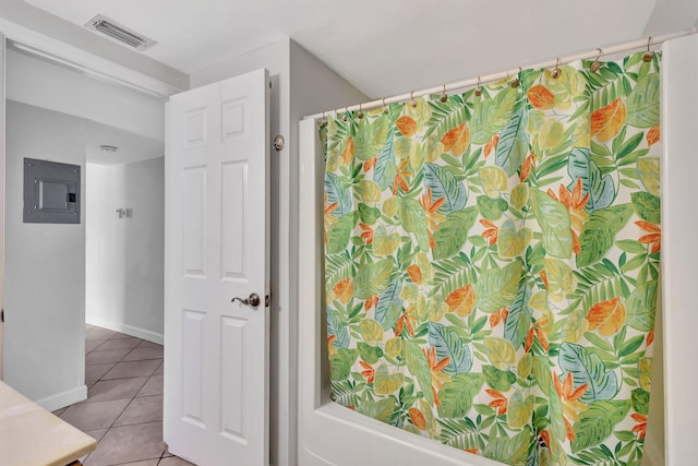 full bathroom with visible vents, tile patterned flooring, baseboards, electric panel, and a shower with curtain
