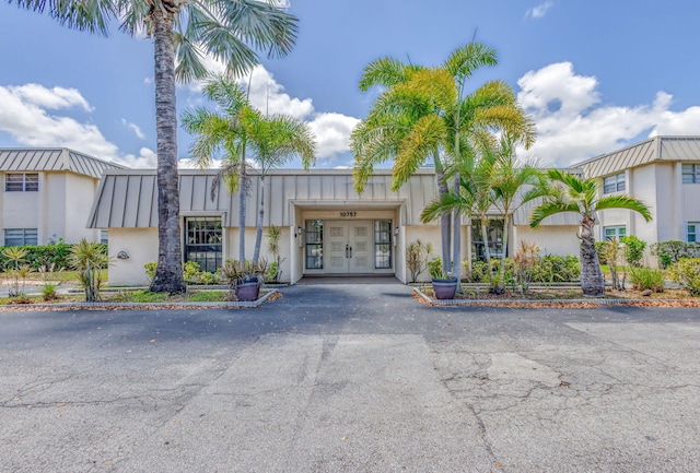 view of property featuring driveway