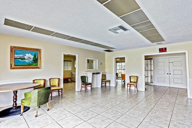 building lobby featuring visible vents