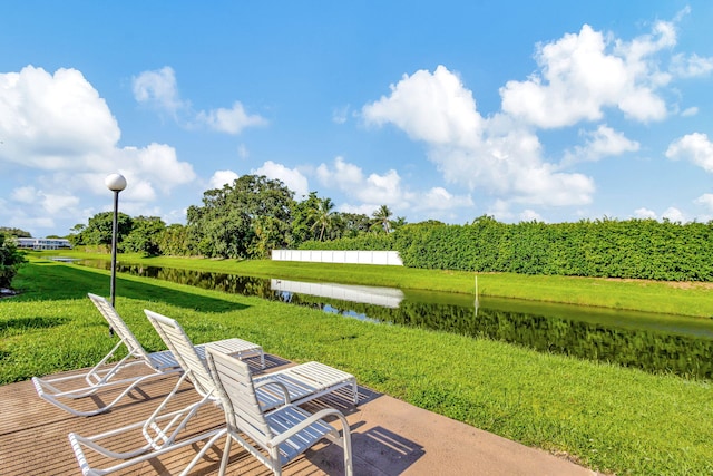 view of patio with a water view