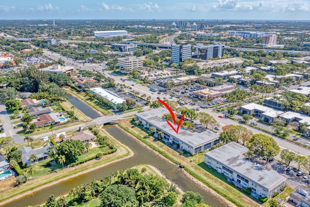 aerial view with a water view and a city view