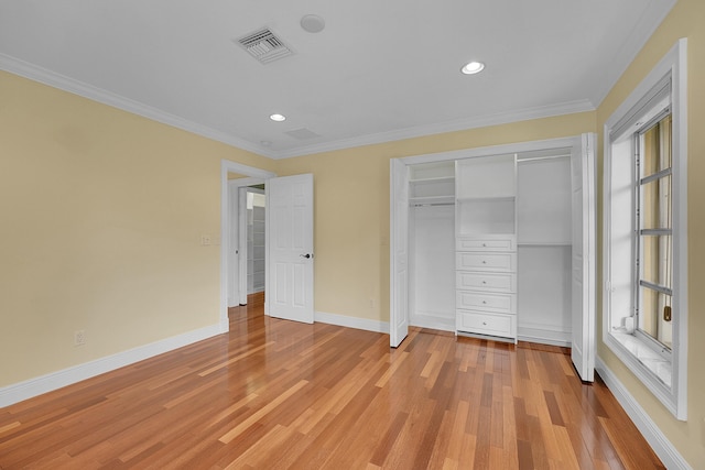 unfurnished bedroom featuring visible vents, crown molding, baseboards, recessed lighting, and light wood-style flooring