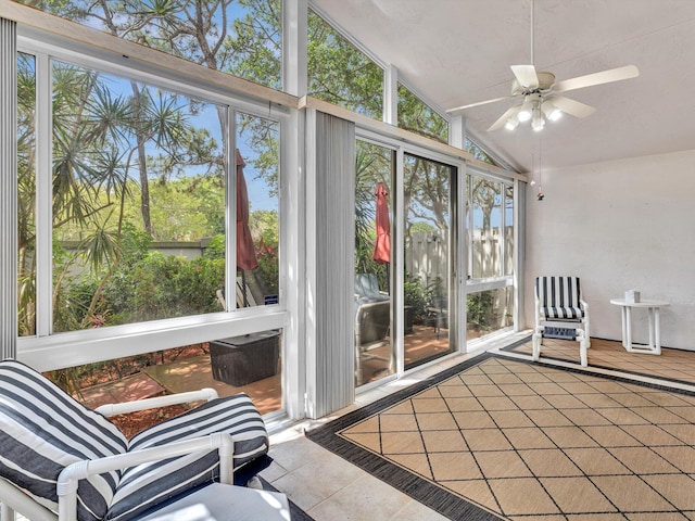 sunroom featuring ceiling fan