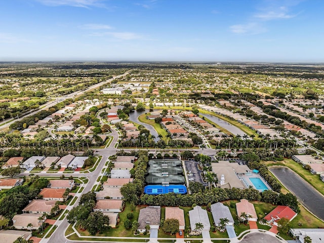 aerial view with a residential view and a water view