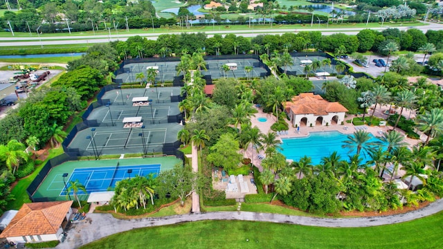 drone / aerial view featuring a residential view and a water view