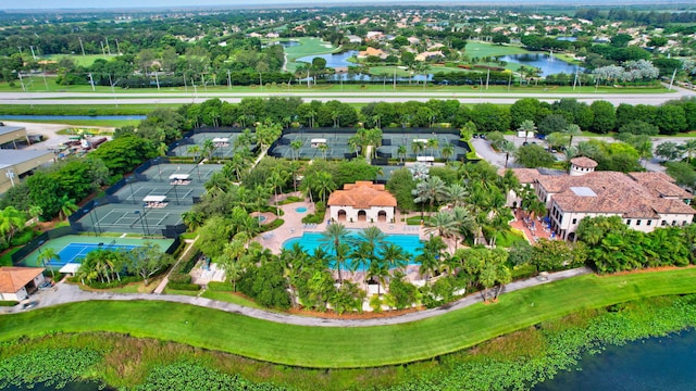 drone / aerial view featuring a water view and a residential view