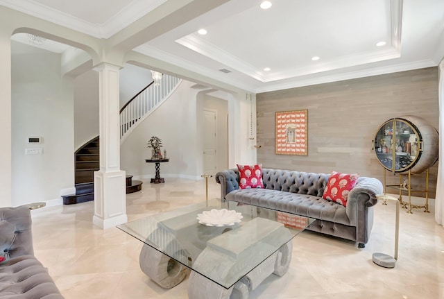living area with ornate columns, recessed lighting, stairway, and baseboards