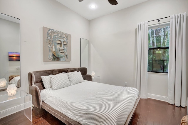 bedroom with baseboards, recessed lighting, wood finished floors, and a ceiling fan