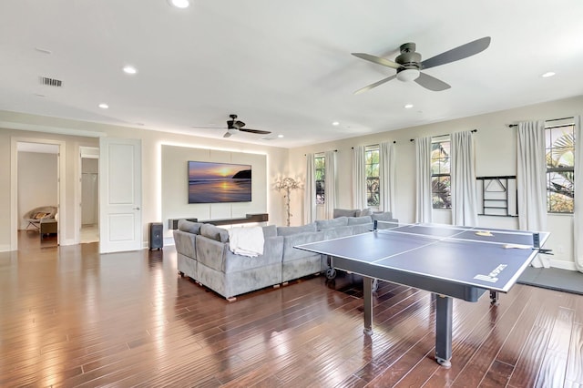 recreation room with recessed lighting, wood finished floors, and a ceiling fan