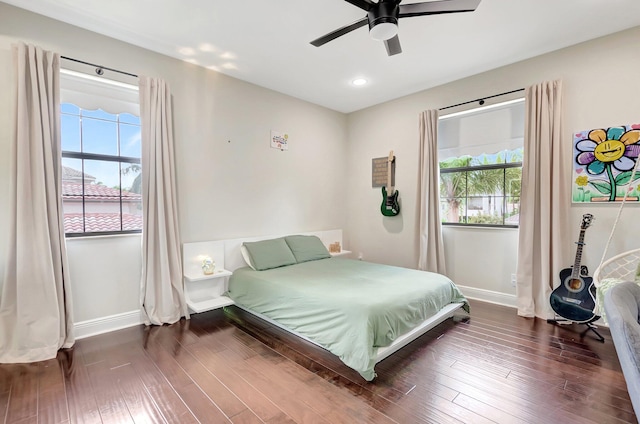 bedroom featuring recessed lighting, dark wood-style flooring, ceiling fan, and baseboards