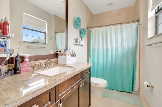 full bathroom with a shower with shower curtain, toilet, tile patterned flooring, and vanity