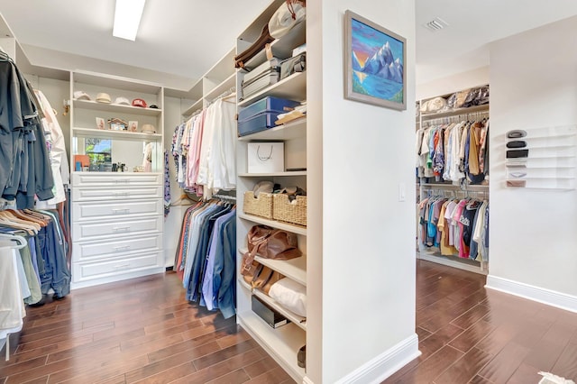 spacious closet with wood finished floors and visible vents