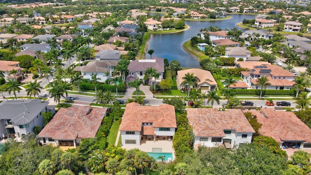 aerial view with a residential view and a water view