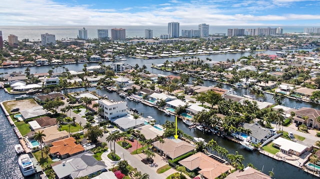 aerial view featuring a residential view, a city view, and a water view